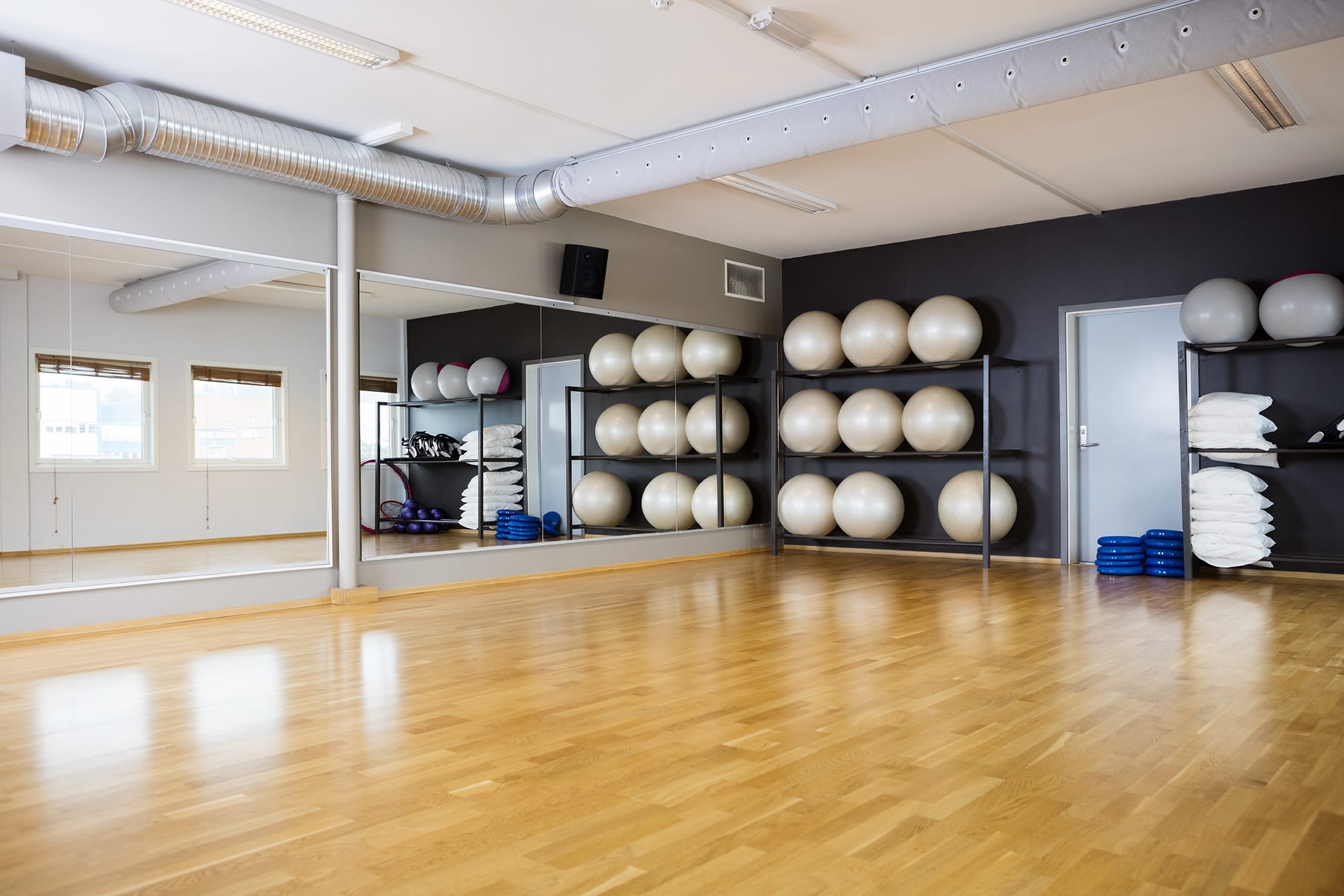 Empty pilates studio with equipment 