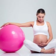 Pregnant Woman with a Pilates Ball